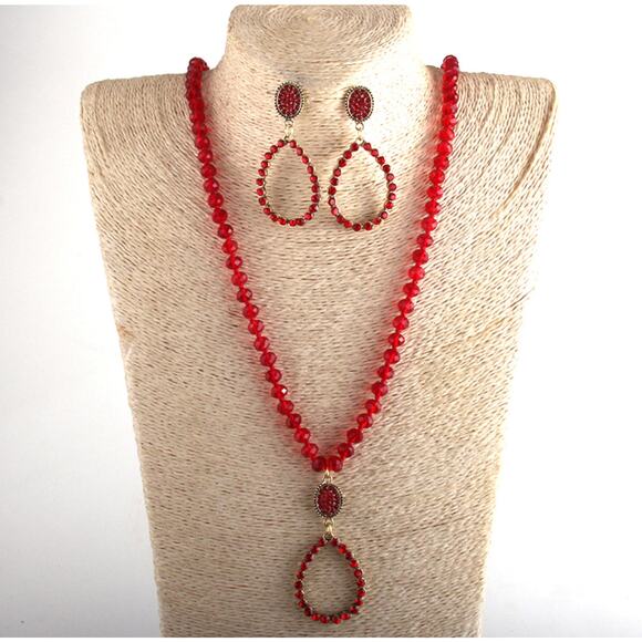 Trendy pierced long gold and red clear bead teardrop necklace and earring set - Picture 1 of 4